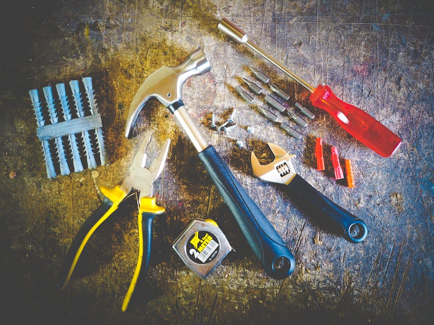 A picture showing the necessary tools and materials for fixing a laminate table top.